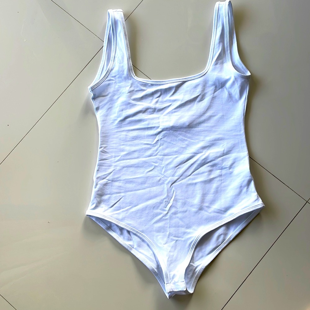 Sunro white body suit. Never been worn before and has been in a box for months.